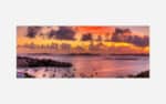 A vibrant painting of a sunset over a marina filled with boats, with a backdrop of islands and a colorful sky reflected in the water.