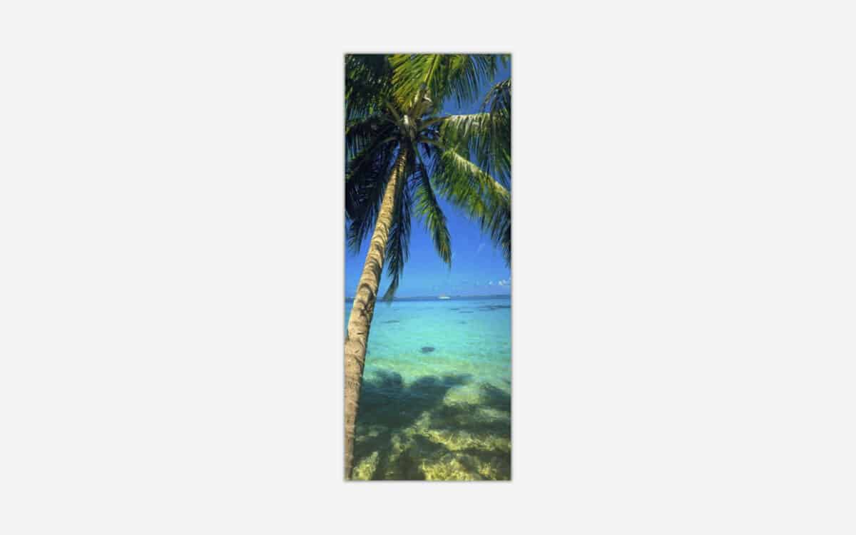 A vertical art piece depicting a singular palm tree leaning over clear turquoise ocean waters with a blue sky in the background.