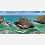 A panoramic art piece depicting a vibrant seascape with sea cliffs, turquoise waters, and waves crashing against rocks.